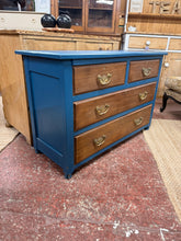 Load image into Gallery viewer, A charming vintage satinwood chest featuring a striking two-tone finish—blue painted body with warm oak-waxed drawer fronts. Four dovetail-jointed drawers provide generous storage, with two shorter drawers above two deeper ones. Structurally sound and in good overall condition, this piece combines character and functionality for any bedroom or hallway.
Delivery Available
Overall Dimensions
106.5cm wide x 46cm deep x 71cm high