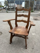 Load image into Gallery viewer, Crafted with solid oak, this Arts & Crafts carver chair boasts exceptional durability and quality construction. Despite minor marks, this item remains in overall excellent condition. Whether used for daily tasks or relaxed lounging, this chair provides both practicality and style.
Overall Dimensions
approx : 67cm wide x 43cm deep x 97cm high
DELIVERY AVAILABLE      
HAVE THIS PAINTED A COLOUR OF YOUR CHOICE FOR AN EXTRA £40 OR HAVE IT COMPLETELY STRIPPED BACK FOR JUST £50    
For our other items se