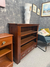 Load image into Gallery viewer, Crafted from oak, this bookcase combines timeless style with practical storage. Features 2 spacious shelves and 4 dovetail-jointed drawers, perfect for organizing books, décor, and essentials. A cable hole at the base keeps cords neatly hidden. Some character marks but nothing major.
Delivery Available
Overall Dimensions
120cm wide x 32.5cm deep x 98cm high