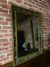 Load image into Gallery viewer, Bring timeless elegance into your space with this captivating Art Deco style mirror. A vintage piece that showcases authentic character and charm, it's structurally robust and ready to make an impact. While it bears the gentle patina of its history with minor surface marks, these only add to its distinctive appeal and story.
Delivery Available
Overall Dimensions
66cm wide x 88cm high 