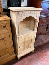 Load image into Gallery viewer, This charming stripped pine pot cupboard showcases the wood's natural beauty after careful restoration. The single cupboard features an internal shelf for convenient storage. Minor white residue is still there but adds to its charm. We recommend applying a protective coat of wax to enhance the wood and seal the surface for lasting durability.
Delivery Available
Overall Dimensions
41.5cm wide x 24cm deep x 91.5cm high