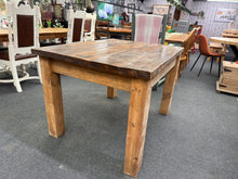 Load image into Gallery viewer, A characterful rustic wooden dining table with authentic patina and lived-in charm. Structurally sound and ready for everyday use, it seats four comfortably and brings warmth to any dining space. The natural marks and wear tell the story of a well-loved piece.
Delivery Available
Overall Dimensions
120.5cm wide x 91cm deep x 78cm high