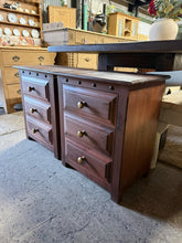 Load image into Gallery viewer, A charming pair of pine bedside tables, both in structurally sound condition with authentic character. Each features three dovetail-jointed drawers offering practical storage. Light surface marks reflect their pre-loved status. Ideal for period bedrooms or those seeking genuine wooden furniture.
Delivery Available
Overall Dimensions
52cm wide x 36cm deep x 61cm high