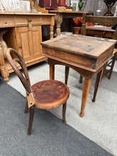 Load image into Gallery viewer, This charming child’s desk and bentwood chair set is sturdy and well-preserved for its age. It’s a delightful addition that will brighten up your child’s room.
Delivery Available
Overall Dimensions
desk measurements : 48cm wide x 41cm deep x 63.5cm high   