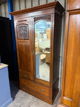 Load image into Gallery viewer, Experience the lasting charm of this remarkable mahogany wardrobe. Remarkably well-preserved and dependable, this piece delivers both visual impact and reliable storage solutions. Minor surface marks only add character, leaving every function intact and ready for daily use. The interior layout maximises your organisational options with a full-length hanging rail for coats and dresses, a substantial drawer for folded garments, and a smaller drawer perfect for accessories and delicate items.
Overall Dimensio