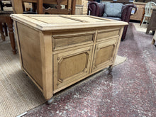 Load image into Gallery viewer, This stripped oak blanket box showcases beautiful natural wood grain, freshly restored to bare timber. Ideal for adding your own finish—a protective wax coat will enhance both appearance and durability. The piece is structurally sound with minor cosmetic wear i.e some missing trim. It sits on castors for convenient repositioning, making it practical for any room.
Delivery Available
Overall Dimensions
84cm wide x 50cm deep x 52.5cm high