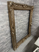 Load image into Gallery viewer, A charming frame brimming with character and vintage appeal! Solidly constructed and well-preserved, this beauty is primed for its next chapter. Whether you're displaying a cherished photograph or a decorative mirror, it's ready to showcase your treasures with timeless elegance and warmth.
Delivery Available
Overall Dimensions
124cm x 154cm 