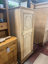 Load image into Gallery viewer, A characterful stripped oak cupboard in structurally sound condition. This pre-loved piece shows gentle signs of age and use, adding to its authentic charm. Features three internal shelves and comes complete with key. A light coat of wax will enhance the wood and provide lasting protection. Perfect for storage with vintage appeal.
Delivery Available
Overall Dimensions
63cm wide x 45cm deep x 145cm high