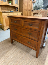 Load image into Gallery viewer, Elevate your interior with this exquisite Victorian oak chest of drawers. Featuring four expertly constructed drawers with traditional dovetail joints, this piece offers ample storage without compromising on aesthetics. The rich oak grain and authentic patina speak to its heritage, making it an investment in both functionality and décor. Whether gracing a bedroom or living area, this substantial furniture piece brings warmth, character, and a touch of Victorian sophistication to any room.
Overall Dimension