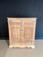 Load image into Gallery viewer, This authentic oak TV unit has been stripped back to reveal its natural grain and character. As a pre-loved piece, it bears gentle signs of use that add to its charm, with no structural concerns. The wood is sound and ready for display—a light coat of wax will enhance protection and bring out the beauty of the grain.
Delivery Available
Overall Dimensions
87.5cm wide x 53.5cm deep x 110cm high
