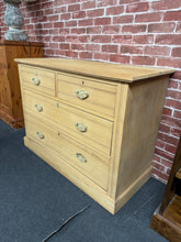Load image into Gallery viewer, This elegant satinwood chest of drawers combines timeless design with practical storage. Structurally sound and in good condition, it features two short dovetail-jointed drawers positioned above two generous long drawers—ideal for organising bedroom essentials or living space. As a pre-loved piece, it bears the gentle patina of age with minor surface marks that add character. A versatile addition to period or contemporary interiors. This item has been stripped so may benefit from a coat of wax for protectio