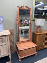 Load image into Gallery viewer, A classic pine freestanding mirror built to last. Structurally sound with excellent overall condition, this piece features a dovetail-jointed drawer for convenient storage. The mirror detaches easily, making it simple to move or rearrange. Perfect for bedrooms and dressing areas.
Delivery Available
Overall Dimensions
64cm wide x 47cm deep x 164cm high