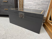Load image into Gallery viewer, Elevate your home storage with this striking blanket box, featuring a sleek black finish complemented by elegant gold detailing along the top. Perfect for keeping toys, blankets, and seasonal items neatly organised, this contemporary piece brings both style and functionality to any room.
Delivery Available
Overall Dimensions
78cm wide x 45cm deep x 36.5cm high
