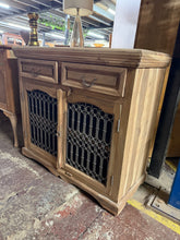 Load image into Gallery viewer, Discover the character of this solid hardwood sideboard, stripped back to reveal its natural beauty. Featuring two spacious drawers positioned above a double cupboard with internal shelf, it delivers generous storage for any room. The authentic patina and minor marks add vintage charm, while the bare wood finish invites personalisation with your choice of wax or stain. A statement piece that combines practical functionality with timeless appeal.
Delivery Available
Overall Dimensions
100cm wide x 46cm dee