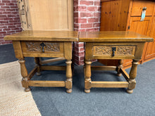 Load image into Gallery viewer, A handsome pair of solid oak bedside tables, each featuring a dovetail-jointed drawer for practical storage. Both units are structurally sound and in good working order. The natural patina and minor surface marks add character and authenticity to these pieces—easily refreshed with furniture wax for a renewed finish. An ideal addition to period or contemporary bedroom schemes.
Delivery Available
Overall Dimensions
52cm wide x 32cm deep x 49cm high 