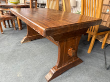Load image into Gallery viewer, A sturdy solid oak dining table built to last. This well-loved piece seats six comfortably and features removable legs for convenient transport and rearrangement. The substantial oak top showcases natural character marks that add authentic charm. Structurally sound and ready for years of family gatherings and meals.
Delivery Available
Overall Dimensions
145cm long x 87cm wide x 77.5cm high