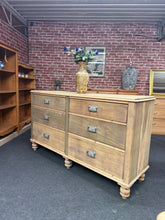 Load image into Gallery viewer, A charming satinwood chest of drawers with authentic character. Structurally sound and in good overall condition, it has weathered patina that creates a distinctive driftwood aesthetic. Six dovetail-jointed drawers provide generous storage space. Perfect for adding vintage appeal to any bedroom or living space.
Delivery Available
Overall Dimensions
151cm wide x 48cm deep x 87cm high