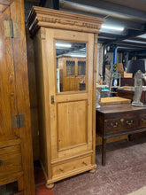 Load image into Gallery viewer, This vintage pine wardrobe is expertly crafted and in excellent condition, offering great structural integrity. It boasts abundant storage options, including a hanging rail, two shelves, and a long dovetail jointed drawer. The front also features a mirror and comes with a key.
81cm wide x 56.5cm deep x 198cm high
DELIVERY AVAILABLE      
For our other items see our website https://fossewayfurniture.co.uk
collection from our shop at cv36, our collection zone at bs36 or otherwise delivery is available