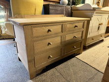 Load image into Gallery viewer, Crafted from solid oak and lovingly stripped to reveal its beautiful natural grain, this charming six-drawer chest is ready for your personal touch. Each drawer features traditional dovetail joinery for durability and smooth operation. A light wax finish will enhance and protect the wood, making it a gorgeous focal point in any room. Perfect for adding warmth and character to your home.
Overall Dimensions
123.5cm wide x 60.5cm deep x 77cm high
DELIVERY AVAILABLE
For our other items see our website