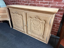 Load image into Gallery viewer, This beautiful oak carved cupboard has been fully restored to its natural finish and could use a coat of wax for added protection. It offers plenty of storage room for your items and is the ideal height for a TV or similar display.
Overall Dimensions
113cm wide x 36.5cm deep x 68cm high
DELIVERY AVAILABLE      
For our other items see our website https://fossewayfurniture.co.uk
collection from our shop at cv36, our collection zone at bs36 or otherwise delivery is available