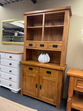 Load image into Gallery viewer, This rustic oak dresser combines timeless design with practical storage. Structurally sound and in good condition, it features three dovetail-jointed drawers with two shelves in the upper section, whilst the base offers two additional drawers and a double cupboard with internal shelf—ideal for displaying or concealing items. A minor surface mark to the top is easily remedied. The piece disassembles into two sections for convenient transport and repositioning. Originally retailing at £799.99, this represents