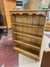 Load image into Gallery viewer, This delightful solid pine bookcase is sturdy and generally in great shape. While it shows some minor marks from use, they only enhance its character. Featuring three fixed shelves, it offers plenty of space for your favourite books and treasures.
Overall Dimensions
92cm wide x 27cm deep x 123cm high
DELIVERY AVAILABLE
For our other items see our website https://fossewayfurniture.co.uk
collection from our shop at CV36 4QZ or purchase online for delivery.