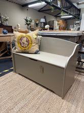 Load image into Gallery viewer, A charming pine storage seat finished in Farrow & Ball's 'London Stone'—a soft, sophisticated neutral that complements any hallway or boot room. The hinged lid opens to reveal practical storage space, ideal for keeping shoes, accessories, and seasonal items neatly tucked away. Structurally sound with authentic character, including natural patina marks that add warmth and personality. A functional piece that bridges style and storage.
Delivery Available
Overall Dimensions
99.5cm wide x 40cm deep x 66c