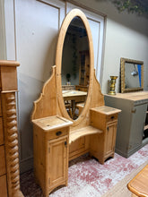 Load image into Gallery viewer, A charming antique pine dressing table with authentic character and solid construction. Features two dovetail-jointed drawers positioned above matching cupboards, offering practical storage with period appeal. The piece shows gentle signs of age and use—minor marks that enhance its vintage charm rather than detract from it. Structurally sound and ready to become a striking focal point in any bedroom or dressing room. A unique statement piece with genuine craftsmanship.
Delivery Available
Overall Dimension