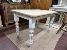 Load image into Gallery viewer, Solid pine dining table featuring distressed white legs and a naturally sanded top that develops character with use. Seats 4–6 guests comfortably, making it ideal for family meals and entertaining. The rustic finish complements country, farmhouse, and cottage interiors beautifully. A light coat of wax will enhance the wood's warmth and provide lasting protection. Versatile enough to work in both traditional and contemporary spaces seeking authentic, lived-in charm.
Delivery Available
Overall Dimensions
1