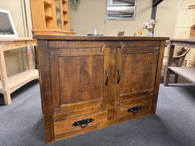 Load image into Gallery viewer, A characterful solid wooden rustic cupboard with authentic patina and genuine vintage appeal. Structurally sound and well-maintained, featuring a spacious double cupboard with internal shelf and two practical drawers below. Perfect for adding warmth and storage to any period or country-style interior. Minor surface marks reflect its honest, lived-in heritage.
Delivery Available
Overall Dimensions
120.5cm wide x 45cm deep x 83cm high