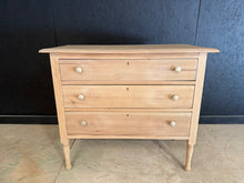 Load image into Gallery viewer, This beautiful satinwood chest of drawers has been carefully restored to reveal its natural grain and finish. Structurally sound with excellent joinery, it features three spacious dovetail-jointed drawers offering generous storage. The stripped finish showcases the wood's character—a light coat of wax will enhance protection and lustre. A versatile piece that brings warmth and craftsmanship to any room.
Delivery Available
Overall Dimensions
91cm wide x 43cm deep x 78.5cm high