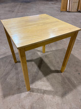 Load image into Gallery viewer, Designed for two diners, this modest oak-effect table suits homes where space is limited. The removable legs make repositioning straightforward, whether you're rearranging your room or transporting it elsewhere. Surface imperfections are minimal and don't affect functionality. A practical choice for compact living areas seeking genuine dining furniture without the bulk.
Delivery Available
Overall Dimensions
69cm wide x 69.5cm deep x 75cm high