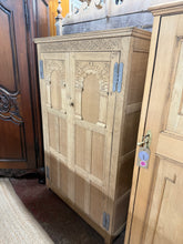 Load image into Gallery viewer, A charming stripped oak wardrobe with authentic natural finish. Features a sturdy hanging rail for garments and two spacious drawers beneath for additional storage. The bare wood invites personalisation with wax or stain to suit your décor. Ideal for children's rooms or compact bedrooms where classic style meets practical organisation.
Delivery Available
Overall Dimensions
88.5cm wide x 48cm deep x 138cm high 
