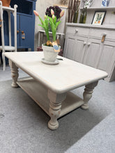 Load image into Gallery viewer, Charming distressed solid pine coffee table in greige, offering both character and practicality. Structurally sound with a lower shelf for convenient storage. Perfect for adding rustic warmth to any living space.
Delivery Available
Overall Dimensions
90cm wide x 59cm deep x 39cm high