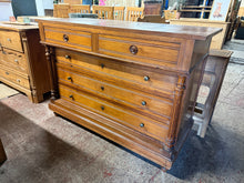 Load image into Gallery viewer, This beautiful wooden chest of drawers is sturdy and well-maintained. While it shows some signs of use, the marks are minor. It offers plenty of storage space with two smaller dovetail-jointed drawers on top and three longer ones below.
Overall Dimensions
129cm wide x 55cm deep x 90cm high
DELIVERY AVAILABLE      
HAVE THIS PAINTED A COLOUR OF YOUR CHOICE FOR AN EXTRA £90 
For our other items see our website https://fossewayfurniture.co.uk
collection from our shop at cv36, our collection zone at bs36