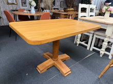 Load image into Gallery viewer, Crafted from solid wood, this dining table combines durability with understated style. Its sturdy construction makes it a reliable centrepiece for everyday meals, accommodating four diners with ease. The removable legs offer practical flexibility for storage or transport, while the table's well-maintained condition ensures years of dependable use.
Delivery Available
Overall Dimensions
120cm long x 80cm wide x 76cm high