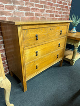 Load image into Gallery viewer, A charming oak chest featuring solid construction and timeless appeal. This pre-loved piece showcases authentic character with minor surface marks that add to its vintage charm. Three spacious dovetail-jointed drawers provide generous storage. Ideal for bedrooms, living spaces, or hallways seeking warmth and functionality. A durable investment piece that blends classic design with practical everyday use.
Delivery Available
Overall Dimensions
92cm wide x 46cm deep 81.5cm high