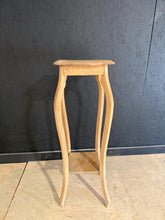 Load image into Gallery viewer, A charming oak plant stand with authentic character. Stripped back to natural wood, it showcases the grain and patina of quality craftsmanship. The tiered design features a lower shelf, perfect for displaying smaller plants or decorative objects. Light wax treatment recommended to enhance and protect the finish. An understated, versatile piece that complements any interior.
Delivery Available
Overall Dimensions
29cm wide x 29cm deep x 88cm high