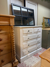 Load image into Gallery viewer, A characterful solid pine chest of drawers with vintage appeal. This sturdy piece features two short dovetail-jointed drawers above three generously proportioned long drawers, providing practical storage for any bedroom or living space. Crafted from quality pine, it shows honest wear and patina befitting its use—minor marks add to its charm. Structurally sound and ready to serve another generation of use.
Delivery Available
Overall Dimensions
104cm wide x 43cm deep x 103cm high