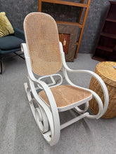Load image into Gallery viewer, A classic bentwood rocking chair with timeless appeal. Finished in white with minor wear that adds character—ideal for restoration enthusiasts or as-is use. Structurally sound and ready to become a cherished fireside companion. The gentle rocking motion offers a peaceful retreat for reading, relaxing, or quiet moments at home.
Delivery Available
Overall Dimensions
approx : 52cm wide x 93cm deep x 97cm high