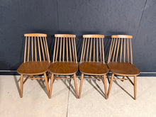 Load image into Gallery viewer, A classic set of four Ercol-style wooden dining chairs, built to last. Structurally sound with good bones, these chairs show honest signs of use with minor surface marks that add to their vintage character. Ideal for completing a dining set or refreshing your table arrangement. Each chair carries the timeless appeal of mid-century design at an accessible price point.
Delivery Available
Overall Dimensions
approx : 40cm wide x 41cm deep x 80cm high