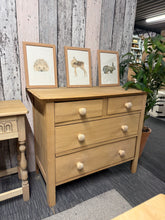 Load image into Gallery viewer, Discover the natural beauty of this stripped satinwood chest of drawers, showcasing authentic wood grain and craftsmanship. Features two short dovetail-jointed drawers over two spacious long drawers, offering ample storage for any bedroom. The piece has been restored to bare wood, making it ideal for finishing with your choice of wax, oil, or stain. A striking focal point that brings warmth and character to your home.
Delivery Available
Overall Dimensions
91.5cm wide x 45cm deep x 77.5cm high 