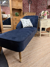 Load image into Gallery viewer, A sophisticated modern chaise lounge in navy blue, offering timeless elegance for any living space. This piece is structurally sound and ready to enhance your home as a striking accent. Features a minor tear consistent with pre-loved furniture, adding character while maintaining its refined appeal.
Delivery Available
Overall Dimensions
139cm long x 62cm wide x 84cm high