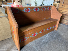 Load image into Gallery viewer, A genuine vintage find, this pine pew stands sturdy and dependable with honest signs of age. The hand-painted detailing reflects traditional artistry and enhances its nostalgic appeal, whilst minor damage to the base isn't anything to worry about and adds to its authentic character. Perfect for period dining settings or traditional interiors.
Delivery Available
Overall Dimensions
150cm wide x 52cm deep x 86cm high