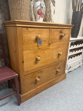 Load image into Gallery viewer, A charming solid pine chest of drawers with authentic character. Featuring two short dovetail-jointed drawers above two spacious long drawers, offering versatile storage for any room. Structurally sound with minor patina marks that enhance its rustic appeal. An ideal addition to country, farmhouse, or traditional interiors seeking genuine craftsmanship and timeless style.
Delivery Available
Overall Dimensions
98cm wide x 45cm deep x 101.5cm high