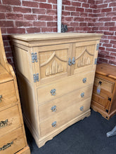 Load image into Gallery viewer, A beautiful oak drinks cabinet with authentic character. Stripped back to natural wood, revealing the grain and patina. Features a spacious double cupboard and three dovetail-jointed drawers for generous storage of glassware, bottles, and barware. The bare wood finish offers flexibility—apply wax or oil to suit your décor and protect the surface. A versatile piece that works equally well as a drinks station, display cabinet, or elegant storage solution in any room.
Delivery Available
Overall Dimensions
8
