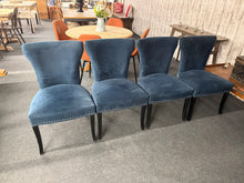 Load image into Gallery viewer, A quartet of navy blue upholstered dining chairs with character. These chairs show minor cosmetic wear on the legs and fabric—but nothing that detracts from their functionality or appeal. Ideal for injecting a rich, sophisticated colour into your dining space without the premium price tag of pristine stock.
Delivery Available
Overall Dimensions
approx : 55cm wide x 48cm deep x 88cm high