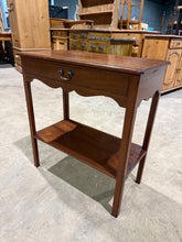 Load image into Gallery viewer, A classic mahogany hall table from Redman & Hales, offering practical storage with a single dovetail-jointed drawer and lower shelf. The piece shows its age with minor surface marks consistent with use, but remains structurally solid and fully functional.
Delivery Available
Overall Dimensions
60cm wide x 32cm deep x 66cm high