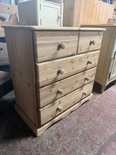 Load image into Gallery viewer, This beautiful solid pine chest of drawers has been carefully restored to its natural finish and would look even better with a wax coat for added protection. It offers plenty of storage space with two dovetail-jointed drawers atop three longer ones, perfect for organising your belongings with ease.
Overall Dimensions
80cm wide x 43.5cm deep x 80cm high
DELIVERY AVAILABLE
For our other items see our website https://fossewayfurniture.co.uk
collection from our shop at CV36 4QZ or purchase online for