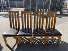 Load image into Gallery viewer, This set of four contemporary oak dining chairs are solidly built and in good overall condition. They have been used and show only minor marks that don’t affect their great appearance.
Overall Dimensions
approx : 49cm wide x 48cm deep x 110cm high
DELIVERY AVAILABLE      
For our other items see our website https://fossewayfurniture.co.uk
collection from our shop at cv36, our collection zone at bs36 or otherwise delivery is available